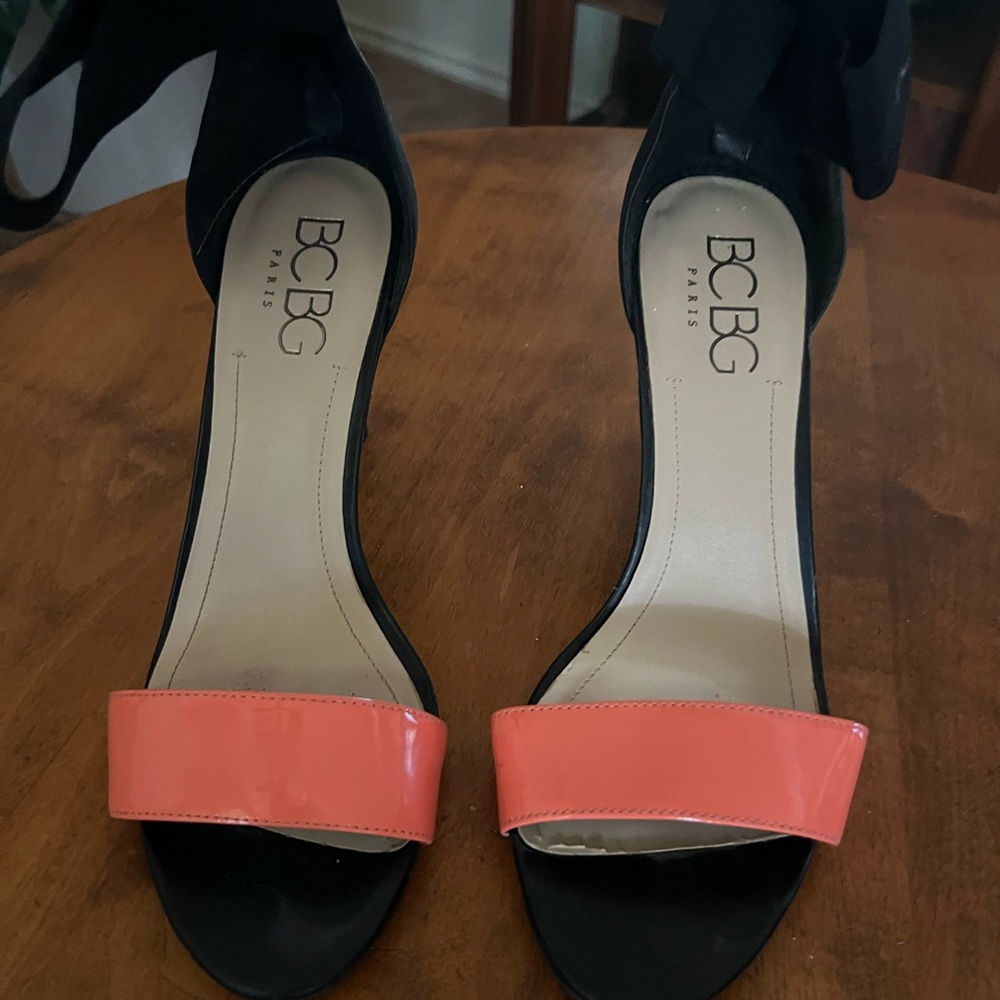 Women’s high heel strap, shoes, orange, and black size 11